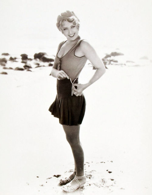 Joan Blondell unzipping scandalous