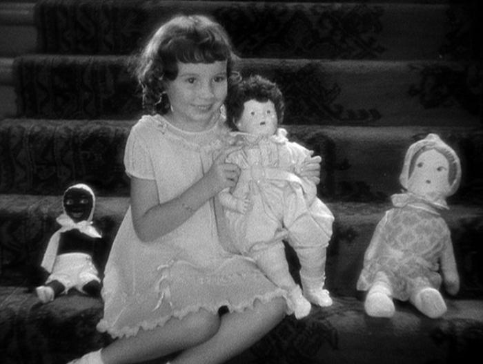 For all of the nice moments between the races in this movie, let's not talk about that doll on the left.