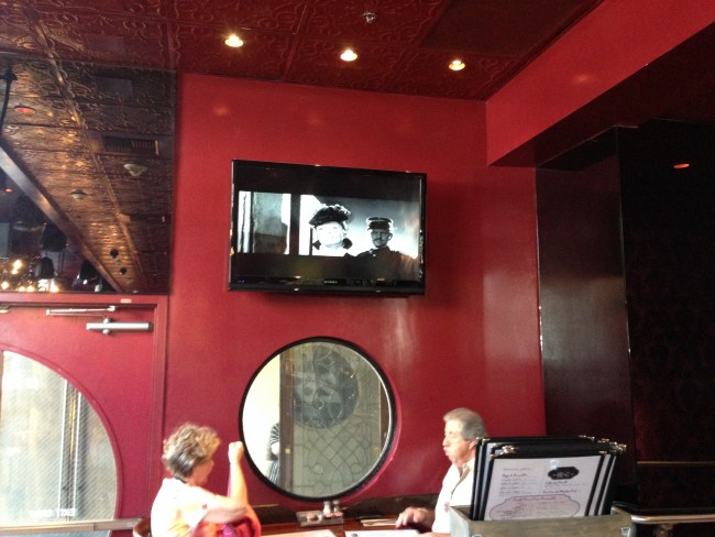 Grabbing a quick bagel in the morning at the Roosevelt's cafe and watching a certain TV show. 